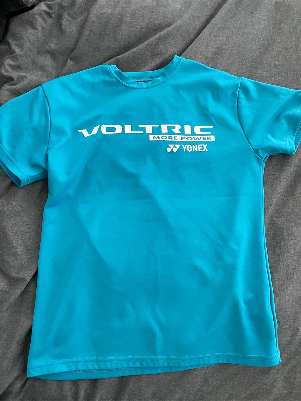 Blue Yonex sports shirt